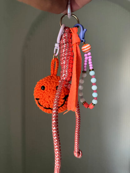 Smiley face bag charm