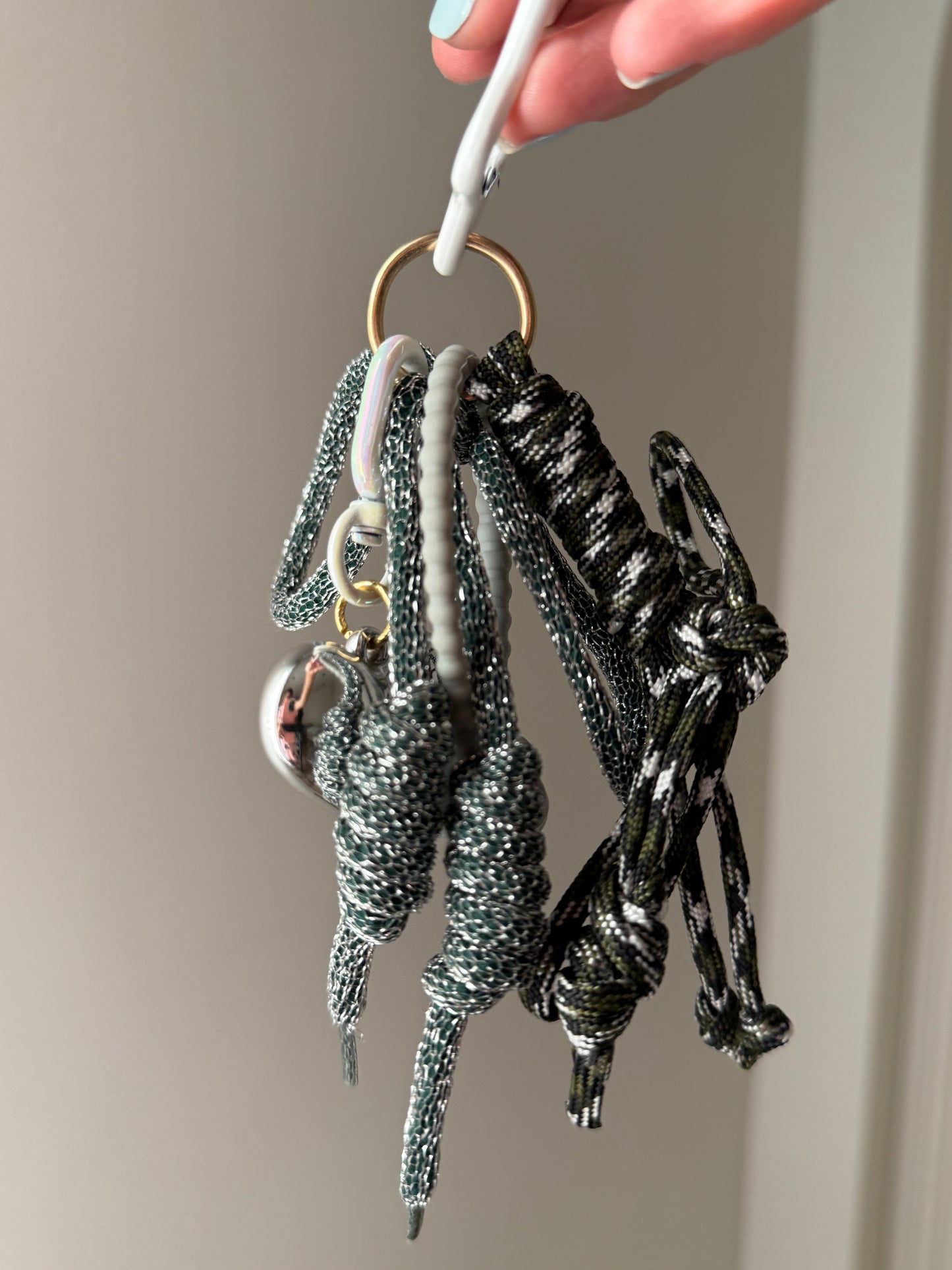 Greyish bag charm