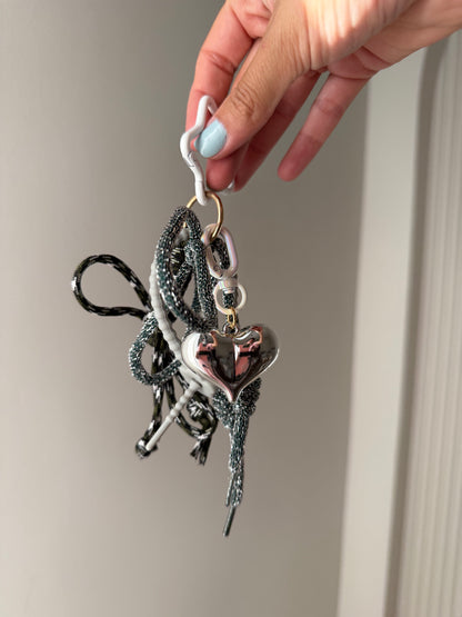 Greyish bag charm